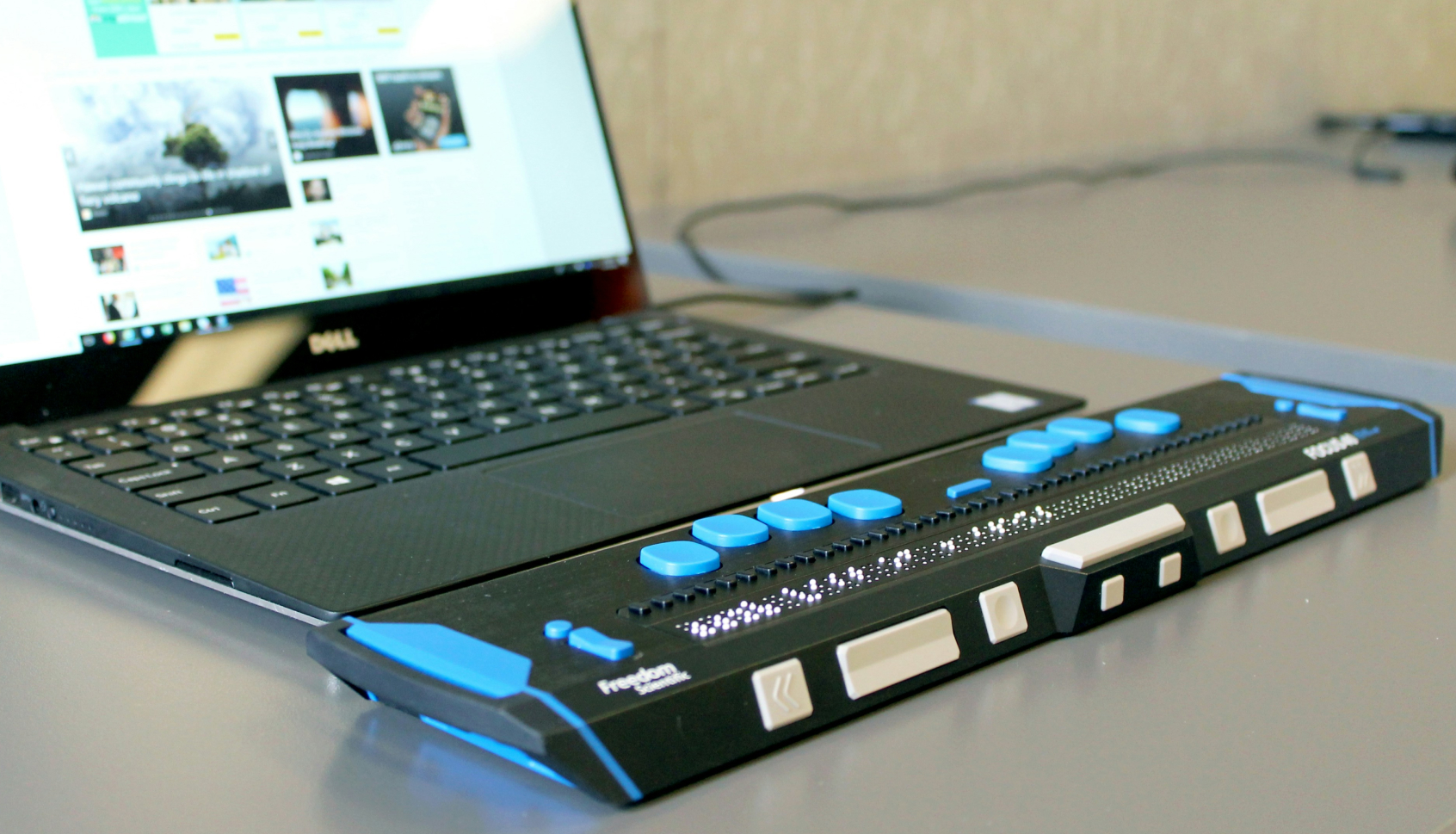 A computer with a refreshable braille display.